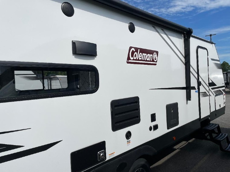 The side view of a Coleman Dutchmen camper.