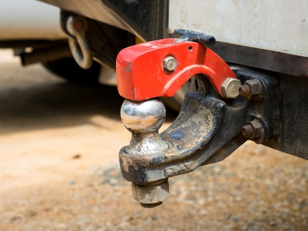 A ball hitch with a safety lock
