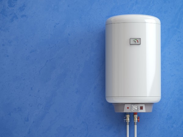 A white camper water heater with a blue background