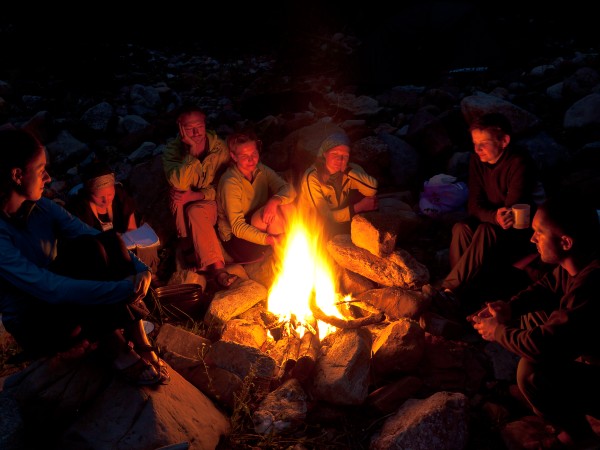 A group campfire in the forest