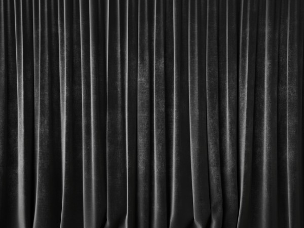 Black and grey shaded curtains on the window