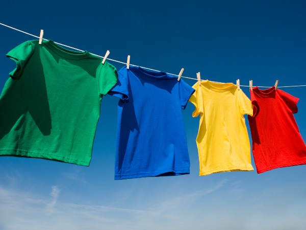 Colorful shirts on a clothelsine